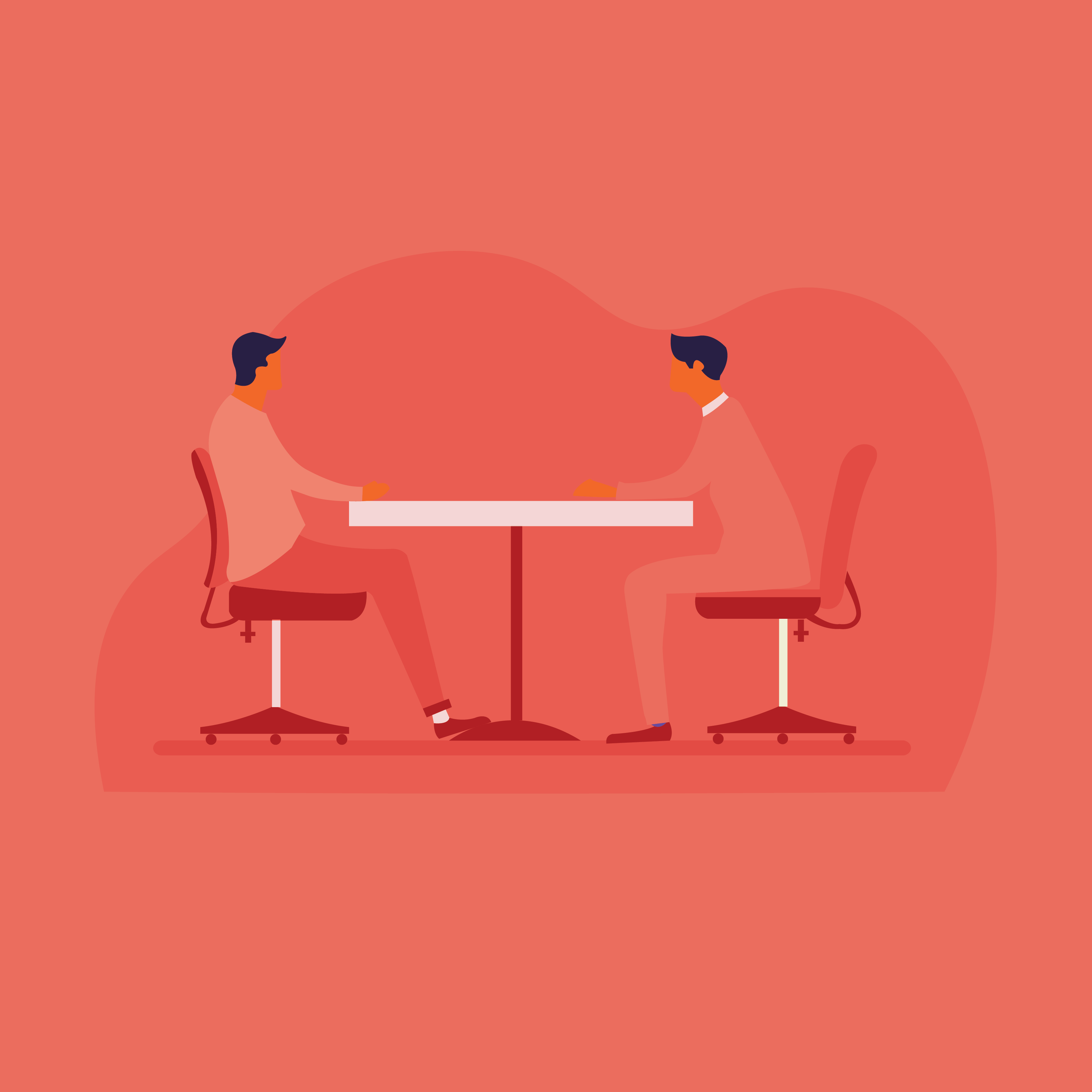 Two people seated at a table, discussing.