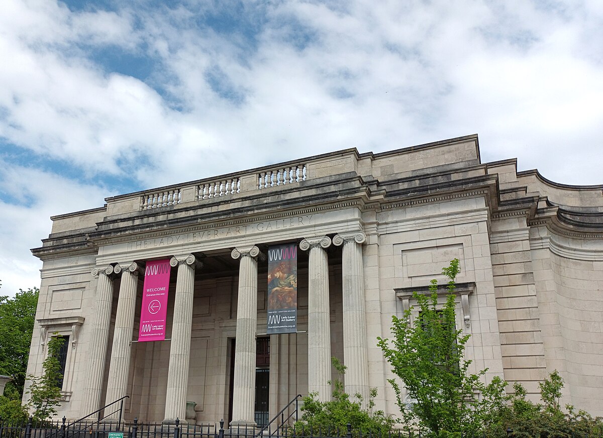 Exterior of the Lady Lever Art Gallery building under a cloudy sky.
